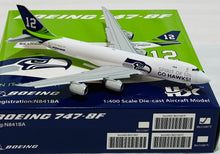 Load image into Gallery viewer, HX Models 1/400 Boeing 747-8F Seattle Seahawks Colour N841BA flaps down B631007F
