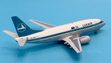 Load image into Gallery viewer, JC Wings 1/200 Luxair Boeing 737-500 LX-LGO
