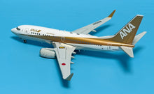 Load image into Gallery viewer, JC Wings 1/200 ANA All Nippon Airways Boeing 737-700 Gold JA02AN
