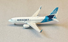 Load image into Gallery viewer, Gemini Jets 1/400 Westjet Airlines Canada Boeing 737-700 C-GWJO
