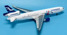 Load image into Gallery viewer, SQ Wings 1/200 Finnair McDonnell Douglas MD-11 OH-LGB Santa Claus L2231
