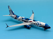 Load image into Gallery viewer, NG models 1/200 Alaska Airlines Boeing 737-800 N559AS Salmon People 08001
