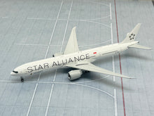 Load image into Gallery viewer, JC Wings 1/400 Singapore Airlines Boeing 777-300ER Star Alliance 9V-SWM
