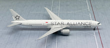 Load image into Gallery viewer, JC Wings 1/400 Singapore Airlines Boeing 777-300ER Star Alliance 9V-SWM
