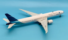 Load image into Gallery viewer, JC Wings 1/200 Garuda Indonesia Boeing 777-300ER Ayo Pakai Masker PK-GIJ
