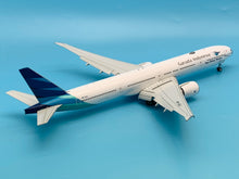 Load image into Gallery viewer, JC Wings 1/200 Garuda Indoensia Boeing 777-300ER Ayo Pakai Masker PK-GIJ flaps down
