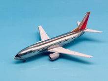 Load image into Gallery viewer, JC Wings 1/200 Southwest Airlines Boeing 737-300 Silver One Polished N629SW
