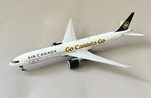 Load image into Gallery viewer, JC Wings 1/400 Air Canada Boeing 777-300ER Go Canada Go C-FITW
