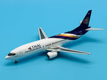 Load image into Gallery viewer, JC Wings 1/200 Thai International Airways Boeing 737-400 HS-TDD
