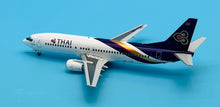 Load image into Gallery viewer, JC Wings 1/200 Thai International Airways Boeing 737-400 HS-TDD
