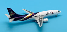 Load image into Gallery viewer, JC Wings 1/200 Thai International Airways Boeing 737-400 HS-TDD
