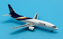 Load image into Gallery viewer, JC Wings 1/200 Thai International Airways Boeing 737-400 HS-TDD

