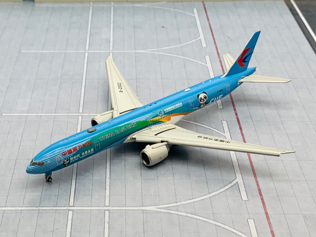 JC Wings 1/400 China Eastern Airlines Boeing 777-300ER CIIE B-2002 flaps down