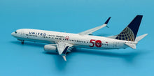 Load image into Gallery viewer, JC Wings 1/200 United Airlines Boeing 737-900ER Special Olympics N66837
