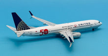 Load image into Gallery viewer, JC Wings 1/200 United Airlines Boeing 737-900ER Special Olympics N66837
