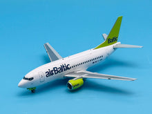 Load image into Gallery viewer, JC Wings 1/200 Air Baltic Boeing 737-500 YL-BBE
