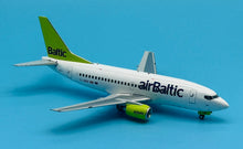 Load image into Gallery viewer, JC Wings 1/200 Air Baltic Boeing 737-500 YL-BBE
