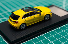 Load image into Gallery viewer, NZG Kilo Works 1/64 Mercedes-AMG A45 S in yellow
