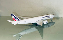 Load image into Gallery viewer, Gemini Jets 1/400 Air France Cargo Boeing 777-200LRF F-GUOC
