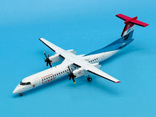 Load image into Gallery viewer, JC Wings 1/200 Luxair Bombardier Dash 8-Q400 Luxair Stands Up LX-LGE
