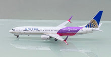 Load image into Gallery viewer, NG models 1/400 United Airlines Boeing 737-900ER N66848 CO-UA merged livery 79013
