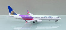 Load image into Gallery viewer, NG models 1/400 United Airlines Boeing 737-900ER N66848 CO-UA merged livery 79013
