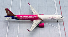 Load image into Gallery viewer, JC Wings 1/400 Wizz Air Airbus A321NEO HA-LGI Team Hungary
