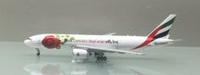 Load image into Gallery viewer, Gemini Jets 1/400 Emirates Sky Cargo Boeing 777-200F A6-EFL with love
