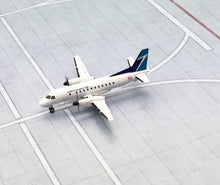 Load image into Gallery viewer, Gemini Jets 1/400 Westjet Canada SAAB SF-340B C-GPCF
