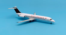 Load image into Gallery viewer, JC Wings 1/200 Air Canada McDonnell Douglas DC-9-32 C-FTLL
