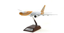Load image into Gallery viewer, JC Wings 1/200 Fly Scoot Boeing 777-200ER 9V-OTD
