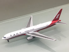 Load image into Gallery viewer, JC Wings 1/400 Shanghai Airlines Boeing 767-300ER B-2563
