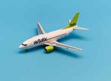 Load image into Gallery viewer, JC Wings 1/200 Air Baltic Boeing 737-500 YL-BBD
