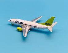 Load image into Gallery viewer, JC Wings 1/200 Air Baltic Boeing 737-500 YL-BBD
