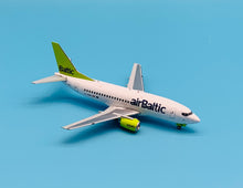 Load image into Gallery viewer, JC Wings 1/200 Air Baltic Boeing 737-500 YL-BBD
