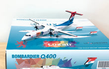 Load image into Gallery viewer, JC Wings 1/200 Luxair Bombardier Dash 8 Q400 LX-LQC "be Pride, be Luxembourg"
