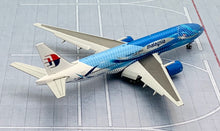 Load image into Gallery viewer, JC Wings 1/400 Malaysia Airlines Boeing 777-200ER Freedom of Space 9M-MRD Flaps Down
