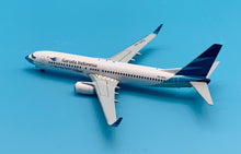 Load image into Gallery viewer, JC Wings 1/200 Garuda Indonesia Boeing 737-800 &quot;Ayo Pakai Masker&quot; PK-GFQ
