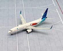 Load image into Gallery viewer, JC Wings 1/400 Garuda Indonesia Boeing 737-800 SukseskanVaksinasi PK-GFT
