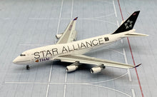 Load image into Gallery viewer, JC Wings 1/400 Thai International Airways Boeing 747-400 Star Alliance HS-TGW flaps down
