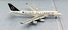 Load image into Gallery viewer, JC Wings 1/400 Thai International Airways Boeing 747-400 Star Alliance HS-TGW flaps down
