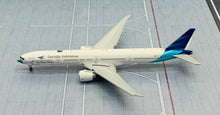 Load image into Gallery viewer, JC Wings 1/400 Garuda Indonesia Boeing 777-300ER Ayo Pakai Masker PK-GIJ flaps down
