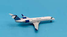 Load image into Gallery viewer, Gemini Jets 1/200 United Express Bombardier CRJ200LR N246PS

