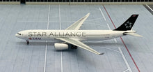 Load image into Gallery viewer, Phoenix Models 1/400 Thai International Airways Airbus A330-300 Star Aliiance HS-TBD
