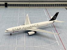 Load image into Gallery viewer, Phoenix Models 1/400 Thai International Airways Airbus A330-300 Star Aliiance HS-TBD
